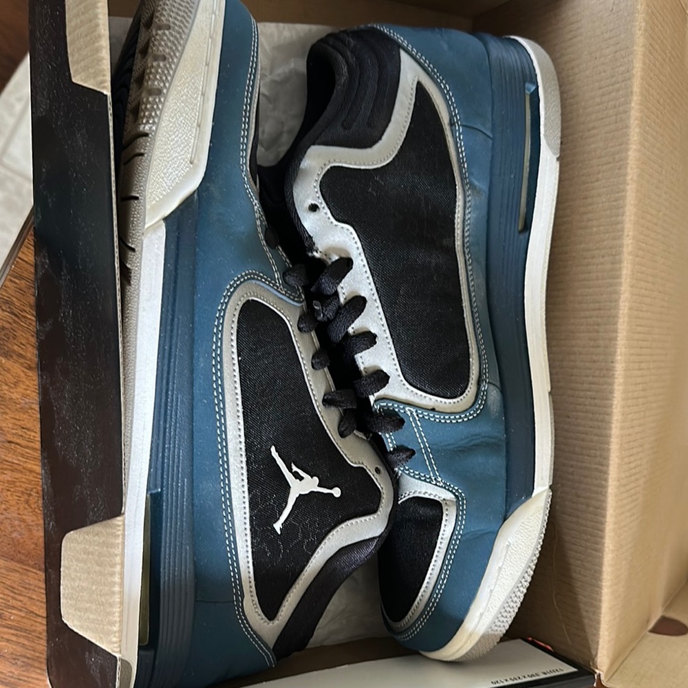 Jordan Black and Blue Sneakers with Iconic Jumpman Logo